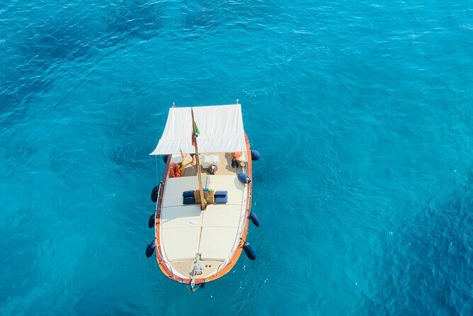 Boat Tour in Capri Italy - The Isola Azzurra coastline: where the limestone turns into a show