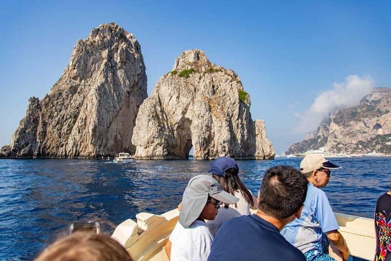 Boat Tour to Capri with Lunch on Board, Swimming and Fun - The Sailing Route: Grottos, Faraglioni, and Big Photo Moments