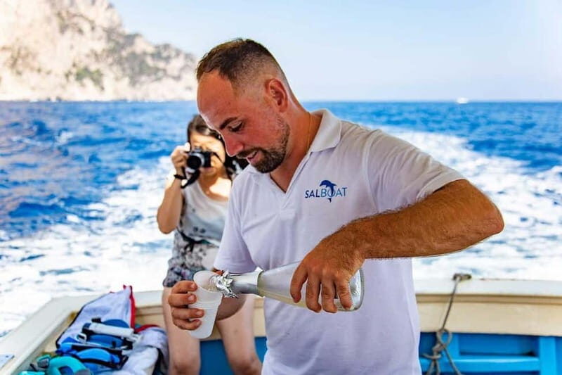 Boat Tour to Capri with Lunch on Board, Swimming and Fun - Caprese Lunch on the Water: Organic Food, Prosecco, and Limoncello