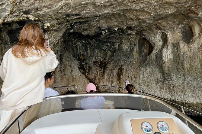 Capri Boat Tour and Blue Grotto Visit - The Blue Grotto: ticket cost, low entrance, and why timing can change