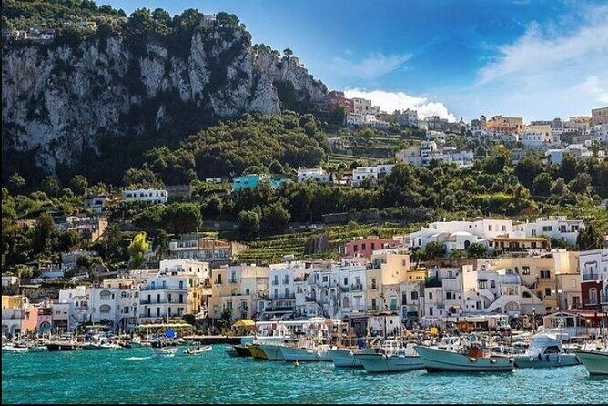 Capri Deluxe/First to Blue Grotto/from Sorrento Positano & Amalfi - Faraglioni and the Arch of Love: the photo stop that feels like a movie set