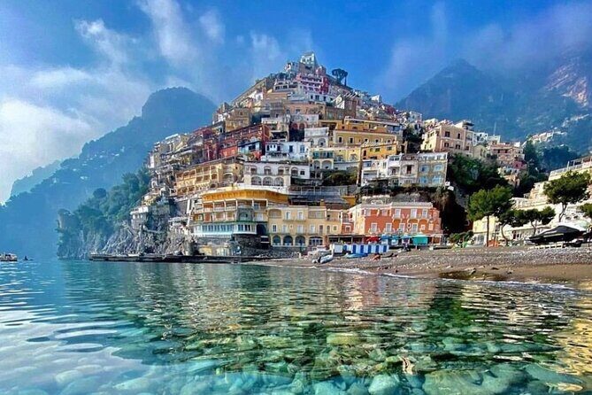 Capri private boat tour - Stop 2: I Faraglioni and the Arch of Love Pass