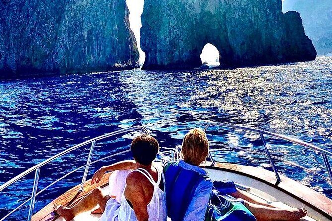 Capri Private Boat Tour from Positano or Praiano - Stop 1: I Faraglioni, the Arch Pass-Through, and Your Swim Break