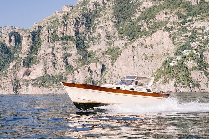Capri Private Boat Tour From Praiano, Positano or Amalfi - Heading out: the Sorrento coast views before Capri