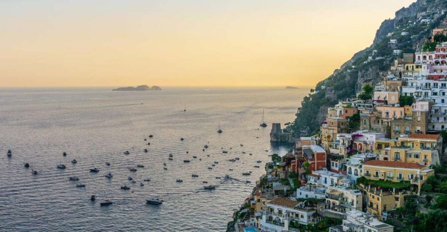 From Amalfi: Private Sunset Cruise along the Amalfi Coast - Leaving harbor views: the Amalfi cliffs in pastel light