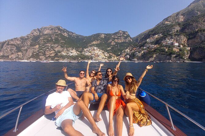 Full Day Private Boat Tour of Amalfi Coast from Positano - Positano’s central port and a private boat day