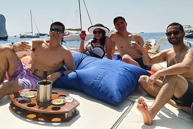 Full-Day Shared Boat Tour to Amalfi and Positano from Sorrento - Punta Campanella: Cliffs, Clear Water, and Marine Life