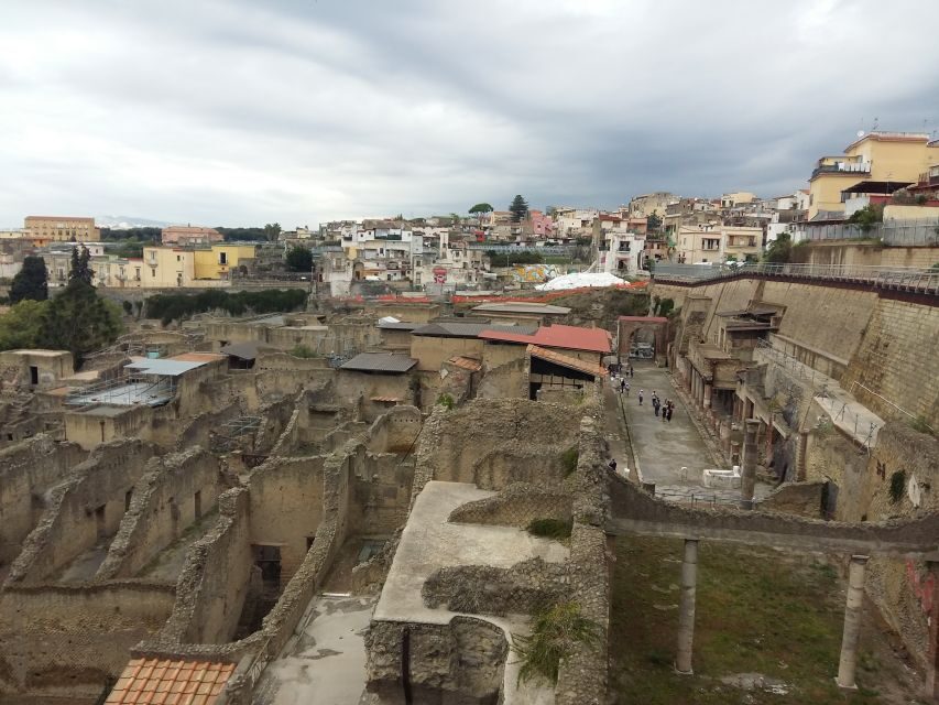 Herculaneum Half-Day Tour from Sorrento - The walking tour: villas, rooms, and why frescoes matter