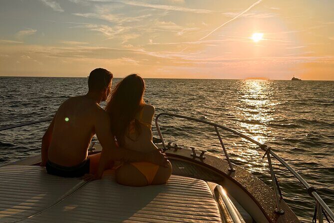 Luxury private boat tour to Capri and Blue Grotto on Gozzo 32 ft - Marina Piccola, Faraglioni, and the Natural Arch: the iconic pass-by moments