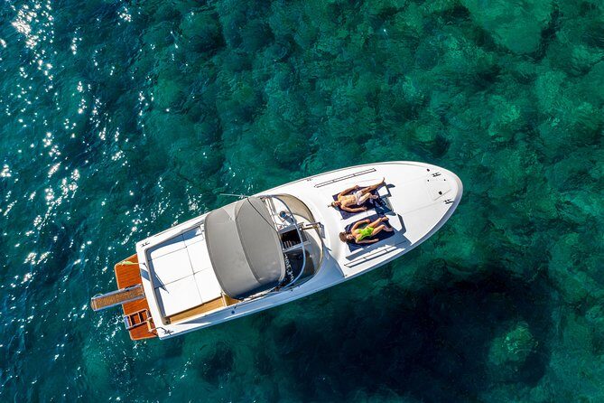 One Day Private Boat Tour of Capri - Faraglioni views from the deck: the money shot
