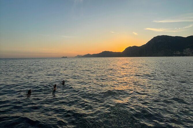 Private Boat Tour at Sunset on the Amalfi Coast - Stop by the Arch of Lovers: swim time with a built-in photo backdrop