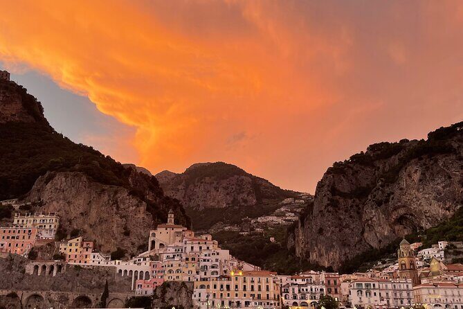 Private Boat Tour at Sunset on the Amalfi Coast - Positano hour: multicolored houses, a relaxing bath, and a calmer pace
