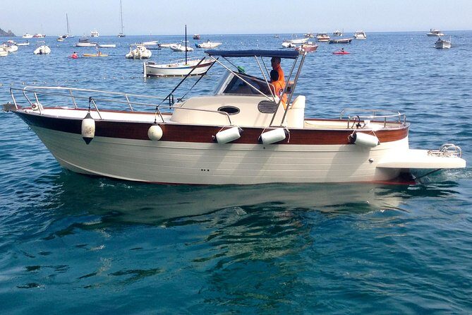PRIVATE CAPRI ISLAND & BLUE GROTTO Full Day boat tour. - Grotta Bianca, Grotta Verde, and Natural Arch: the “icon stops” from the water