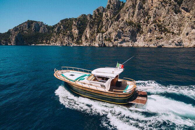 Shared boat tour to Capri from Sorrento - Capri by boat: Natural Arch, Faraglioni, and three grottos