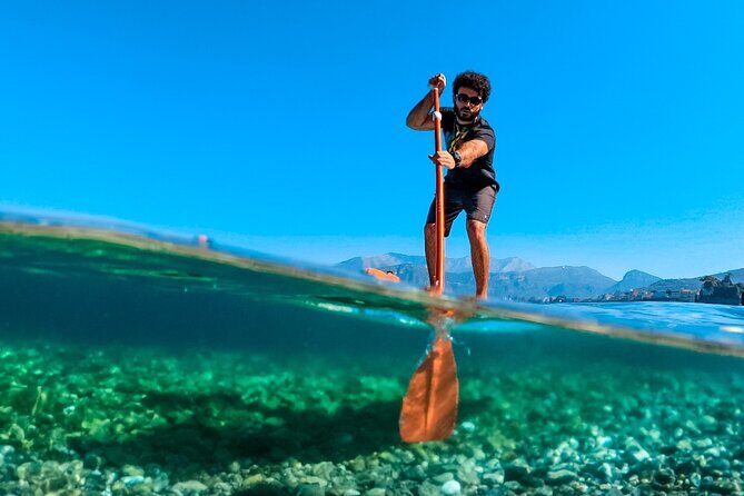 Small group paddle boarding tour to Bagni Regina Giovanna - The safety lesson that helps you stand up