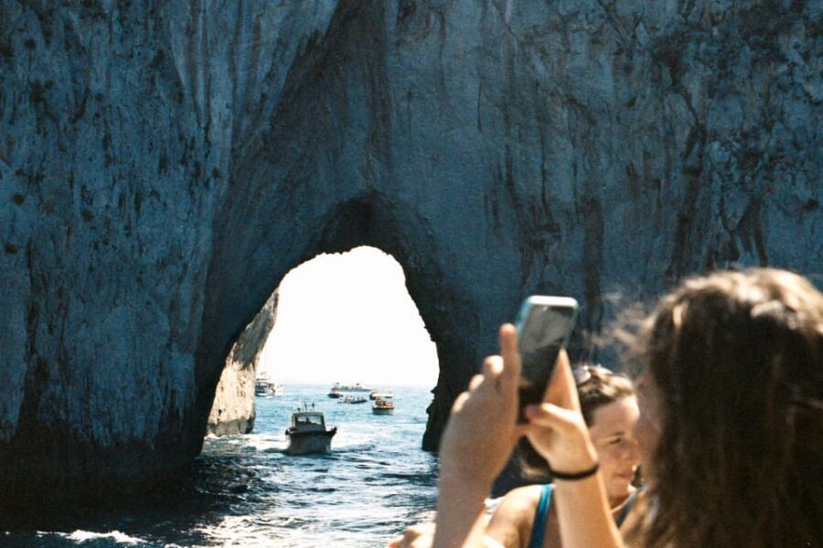 Sorrento: Capri and Blue Grotto Yacht Tour with Snorkeling - Green Grotto, Arco Naturale, and the photo-stop rhythm