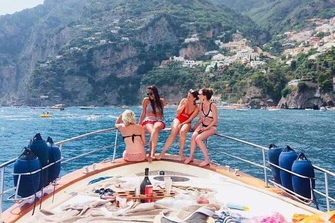 Special Blue Grotto & Capri Island departure DA Sorrento - On the return: cruising past Cala di Puolo on the Sorrento side