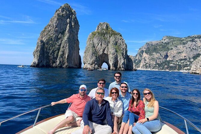 The 2 South gems: Capri and Positano Day Cruise - On-board setup: snacks, towels, bathroom, and snorkeling gear