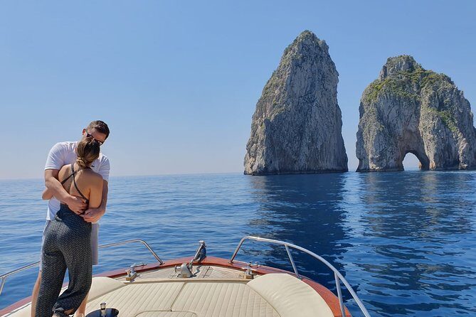 The Blue Fever: Capri island day cruise - The Capo di Sorrento coastline: Bagni Regina Giovanna and the White/Green Grottos